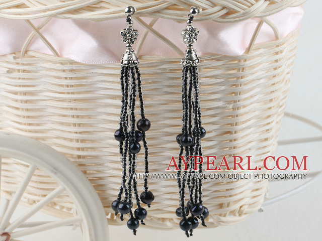 brillant Boucles d'oreilles perles noires et gland