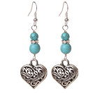 Boucles d'oreilles turquoise avec triangle belle charmes