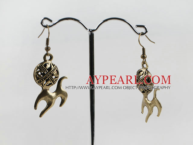 belle forme en cuivre boucles d'oreilles des animaux