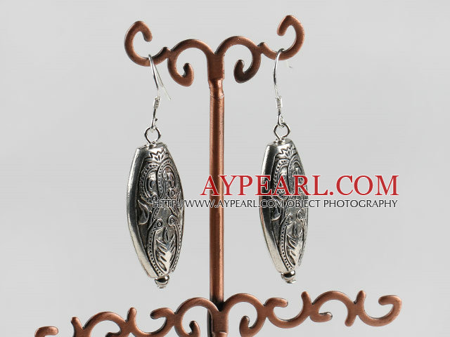 vogue jewelry silver like earrings with engraved print