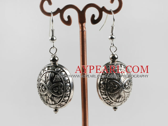 vogue jewelry silver like earrings with engraved print