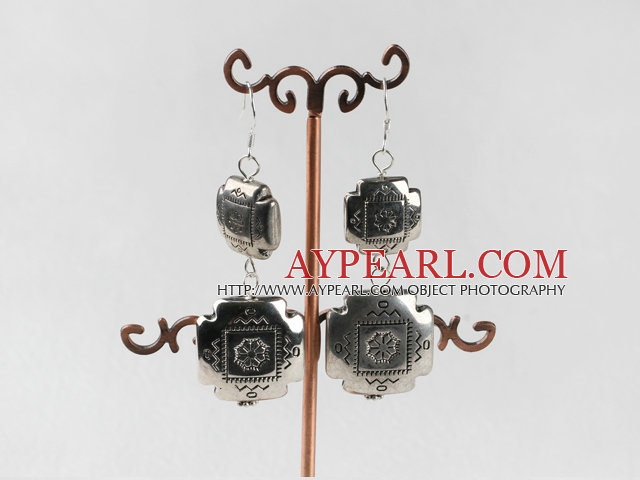 good luck CCB silver like earrings with engraved print