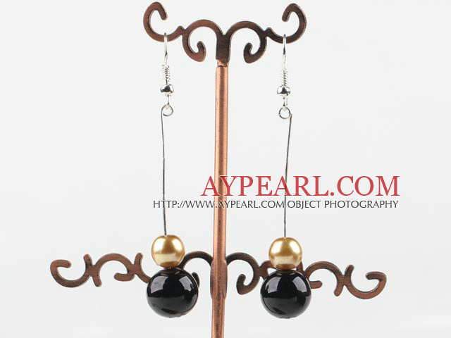 pendantes en or et boucles d'oreilles noires balle arcylic