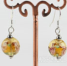 lovely ball shape yellow colored glaze earrings