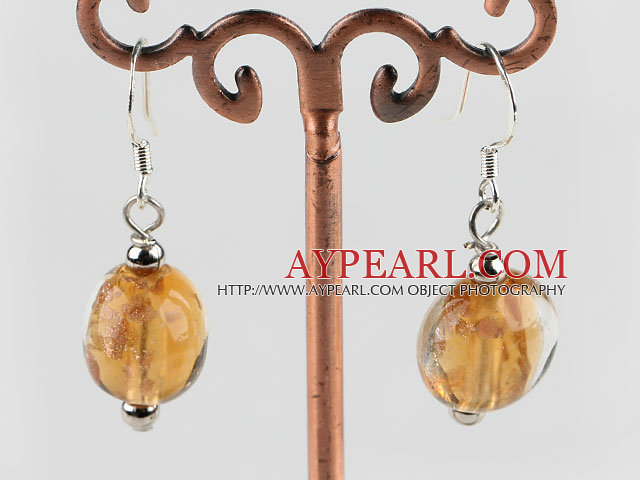 lovely round shape light yellow colored glaze earrings