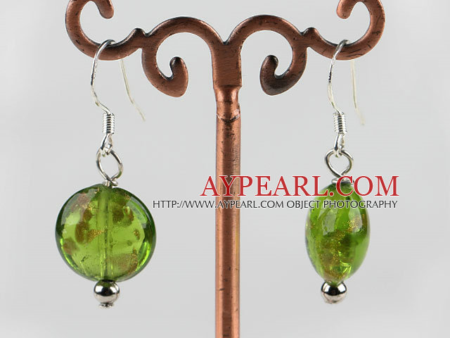 lovely round shape green colored glaze earrings