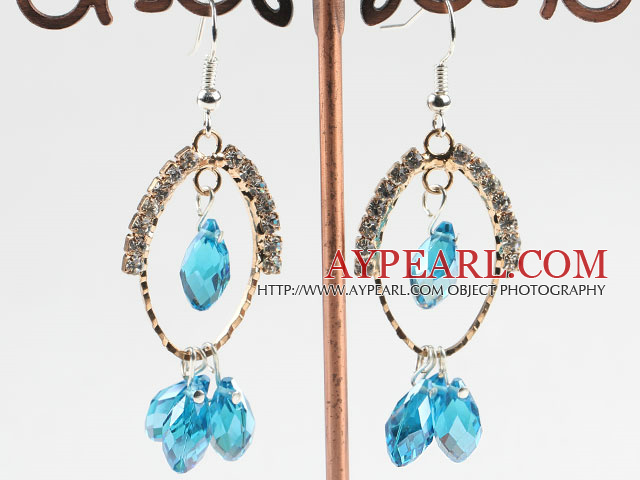 lovely sea blue crystal earrings on gold tone loop with rhinestone