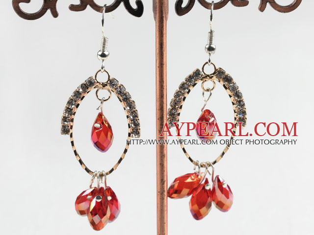 lovely red crystal earrings on gold tone loop with rhinestone