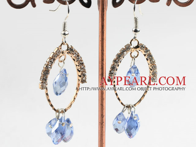 lovely light blue crystal earrings on gold tone loop with rhinestone