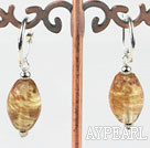 Cute style horse eye shape champagne colored glaze earrings