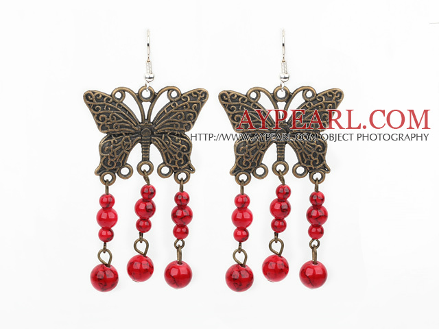 Boucles d'oreilles rouges de sang de pierre