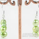 dyed green pearl earrings