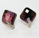 red manmade gem like earrings with rhinestone