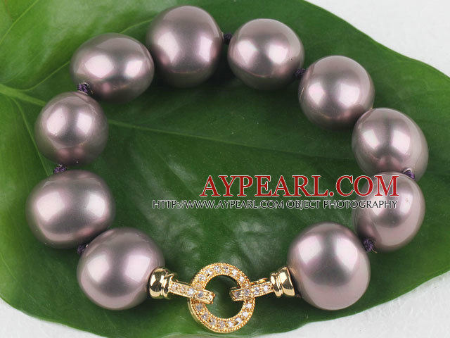 high quality egg shape coffee color sea shell beads bracelet with gold plated clasp