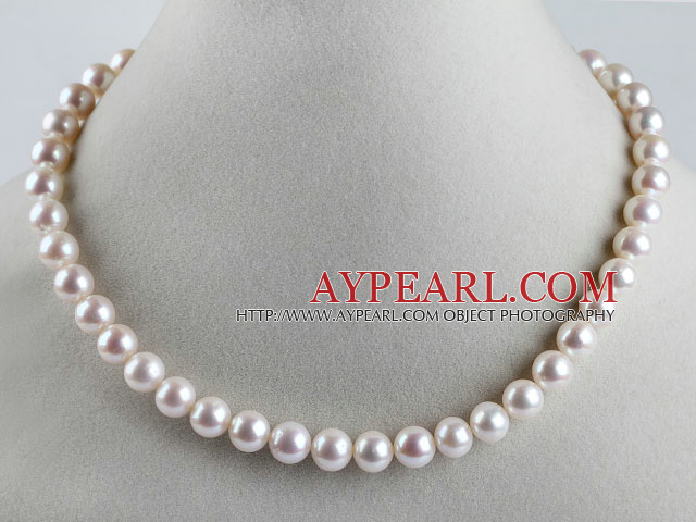 Un favori grade 15,7 pouces 10-10.5mm naturelles ronde collier de perles blanches