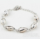 Fashion Style Rice Shape White Freshwater Pearl Metal Bracelet with Adjustable Chain