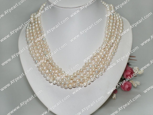 multi strand white pearl necklace with moonlight clasp