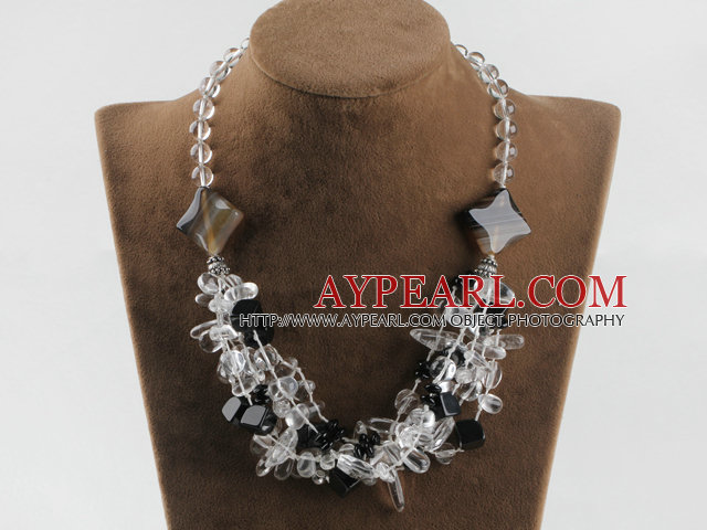 het design vit kristall och svart agat halsband