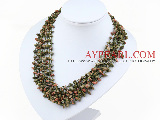 multi strand green piebald stone neckalce with shell flower clasp