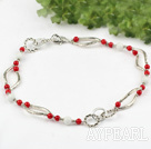 red coral and white sea shell necklace with flower shaped lobster clasp