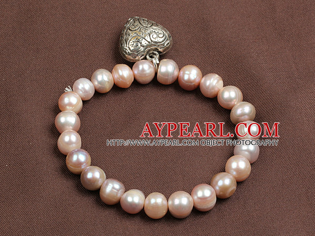 Simple Elegant stil Natural Pink Freshwater Pearl Elastisk / Stretch armbånd med Tibet Silver Hjerte Charm