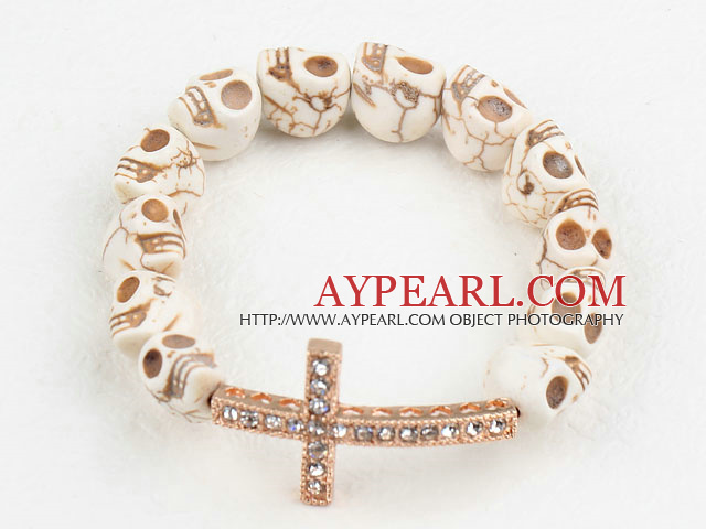 Golden Color Rhinestone Sideway/Side Way Cross and Howlite Skull Stretch Halloween Bracelet