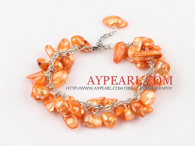 irregular shape dyed orange pearl bracelet with extendable chain