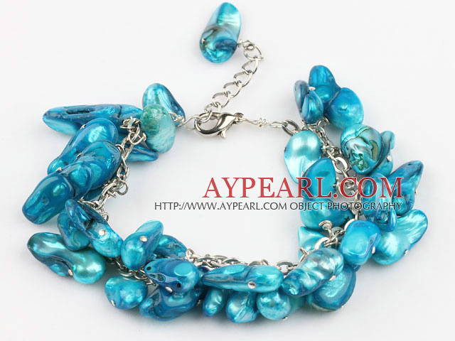 dyed blue pearl bracelet with metal chain and lobster clasp
