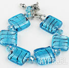 sea blue colored glaze and  crystal bracelet with toggle clasp