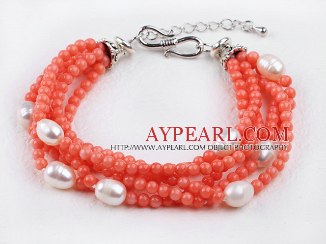 multi strand orange coral and white pearl bracelet with extendable chain