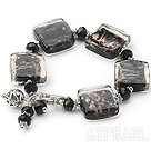 brown colored glaze and  black crystal bracelet with toggle clasp