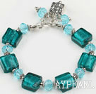 green colored glaze and  crystal bracelet with toggle clasp