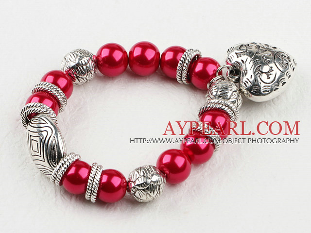 Red acrylic pearl stretch bracelet with heart charms