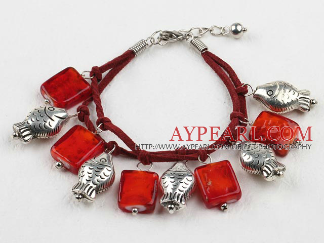 red colored glaze and fish charm bracelet with extendable chain