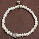 Simple Elegant Style 4-5Mm Natural White Freshwater Pearl Elastic/ Stretch Bracelet With Lotus Seedpod Charm