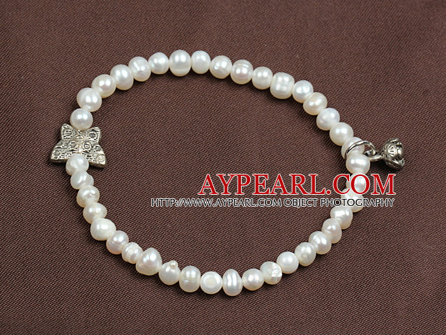 Simple Elegant Style 4-5Mm Natural White Freshwater Pearl Elastic/ Stretch Bracelet With Lotus Seedpod Charm