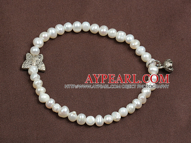 Simple Elegant stil 4-5mm Natural White Ferskvann Pearl Elastisk / Stretch armbånd med Lotus Seedpod Charm