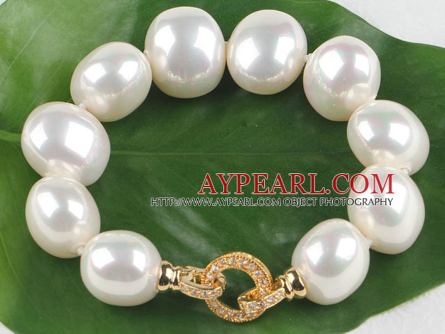 high quality egg shape white sea shell beads bracelet with gold plated clasp