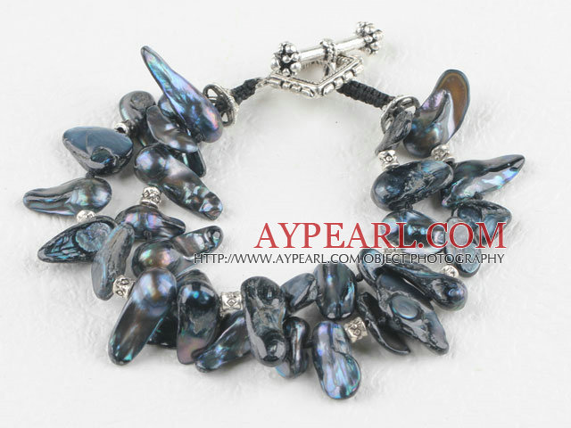 Two strand black teeth shape black pearl bracelet with toggle clasp