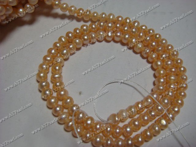 Freshwater pearl beads,7-8mm round sold per 15-inch strand.