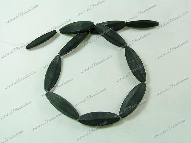 Black stone beads, 10*35 shuttle, sold per 15.7-inch strand.