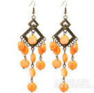 Vintage Style Rhombus Shape Accessory and Flat Round Orange Shell Long Earrings