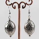 vogue jewelry silver like earrings with engraved print