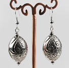 vogue jewelry silver like earrings with engraved print