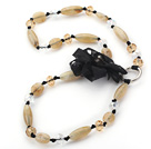 Long Style Light Yellow Color Acrylic and Crystal Necklace with Black Ribbon Flower