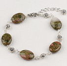 green piebald stone bracelet with lobster clasp