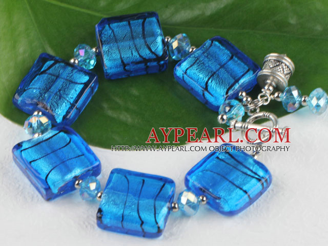 blue colored glaze and  crystal bracelet with toggle clasp
