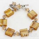 yellow crystal and colored glaze bracelet with toggle clasp