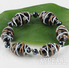 elastic 7.5 inches black colored glaze and crystal bracelet 