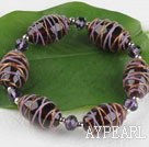 elastic 7.5 inches purple colored glaze and crystal bracelet 